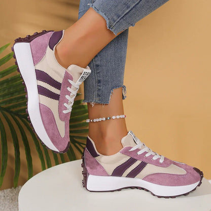 Women's pink, cream and purple walking trainers shown in side profile