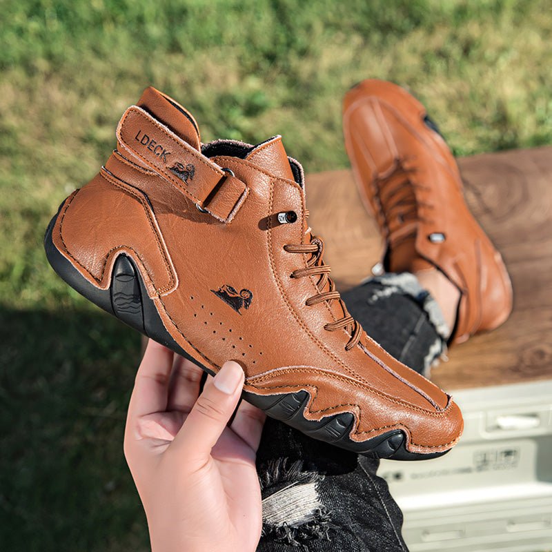 Unisex leather boots with wide toe design and adjustable ankle strap