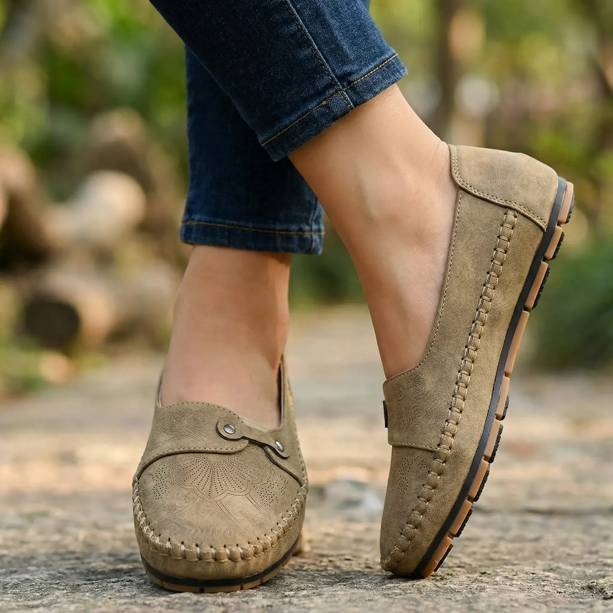 Women's khaki loafers shown on foot