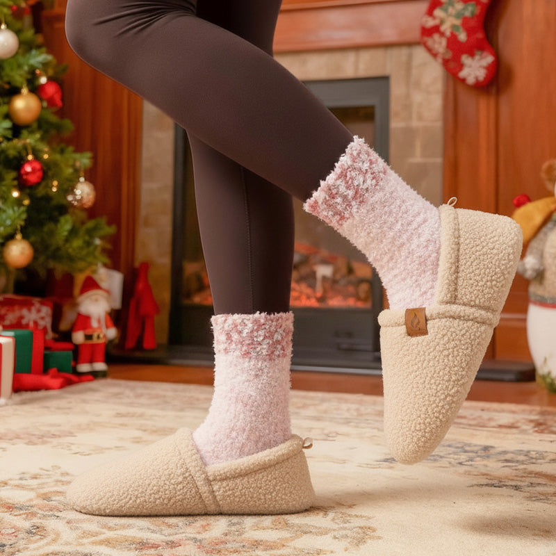 Auldweave women's warm shearling slippers – cream slippers worn by a fireplace