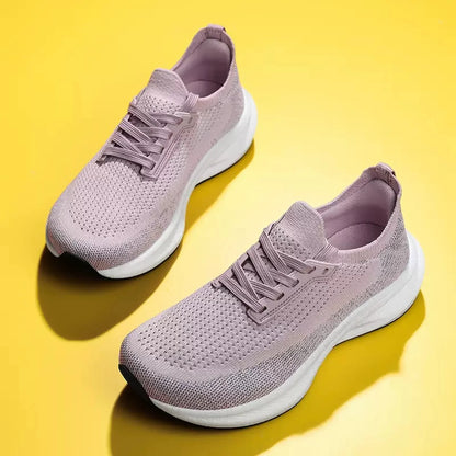 Dusty mauve breathable knit trainers with a white cushioned sole