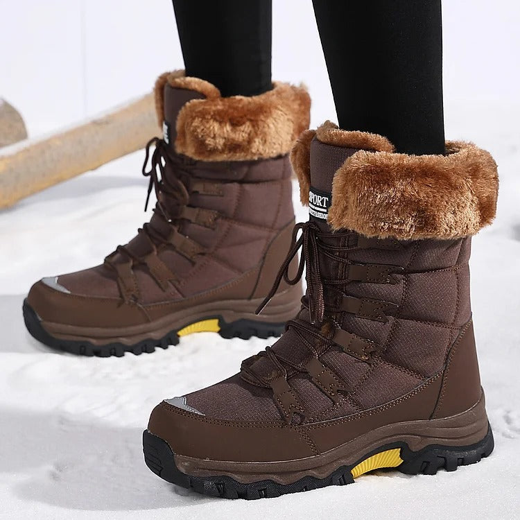Coffee-brown winter boots with tan fleece cuffs worn outdoors