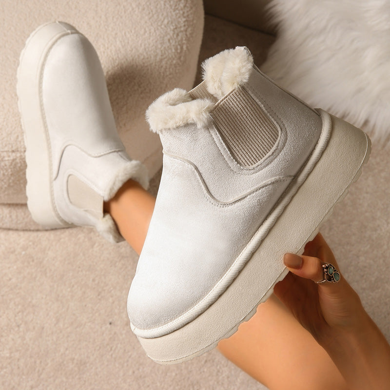 Plush-lined platform ankle boots – cream pair worn with jeans