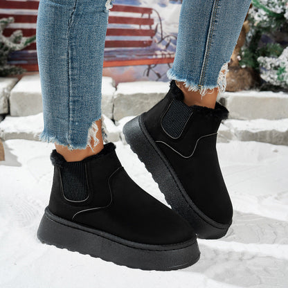 Plush-lined platform ankle boots – black pair in snow