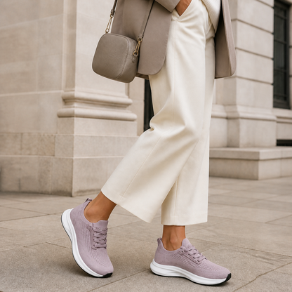 Dusty mauve work trainers styled with ivory city tailoring