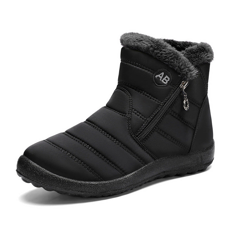 Black quilted winter ankle boot with a side zipper and fleece collar