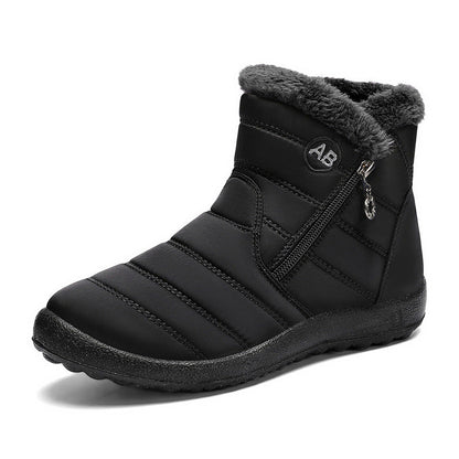 Black quilted winter ankle boot with a side zipper and fleece collar