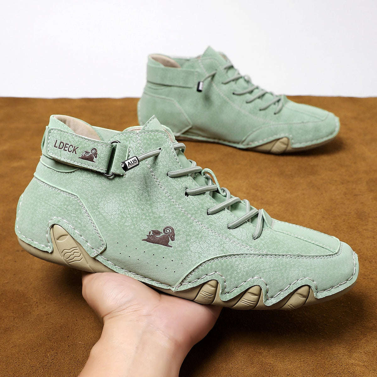 Unisex leather boots with wide toe design and adjustable ankle strap