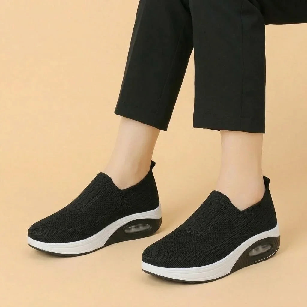 Women's walking trainers shown on foot