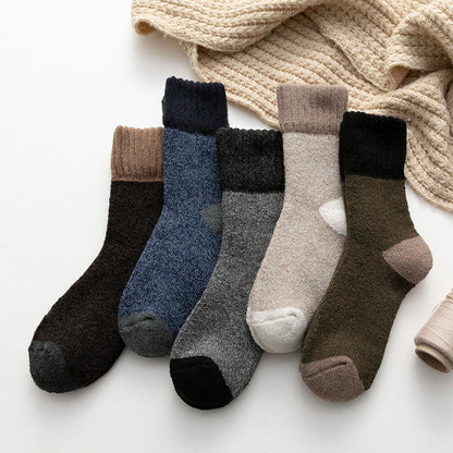 Five-pair winter knit sock set – five pairs beside a knitted scarf
