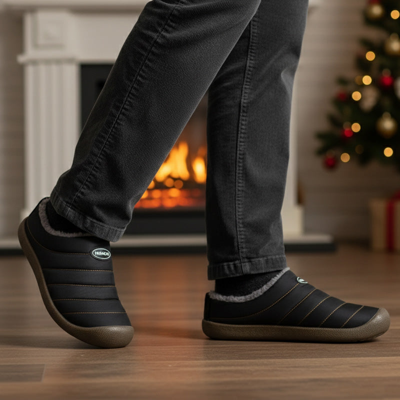 Fleece-lined winter clogs – black pair worn indoors