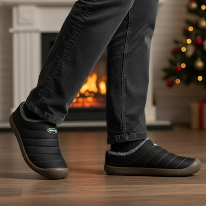 Fleece-lined winter clogs – black pair worn indoors