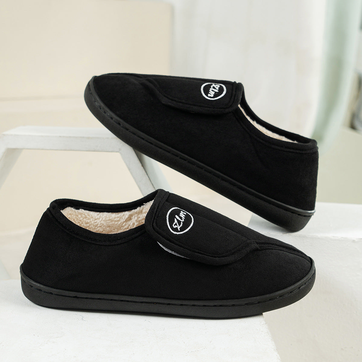 Auldweave women's adjustable wide fit slippers – black pair showing adjustable straps