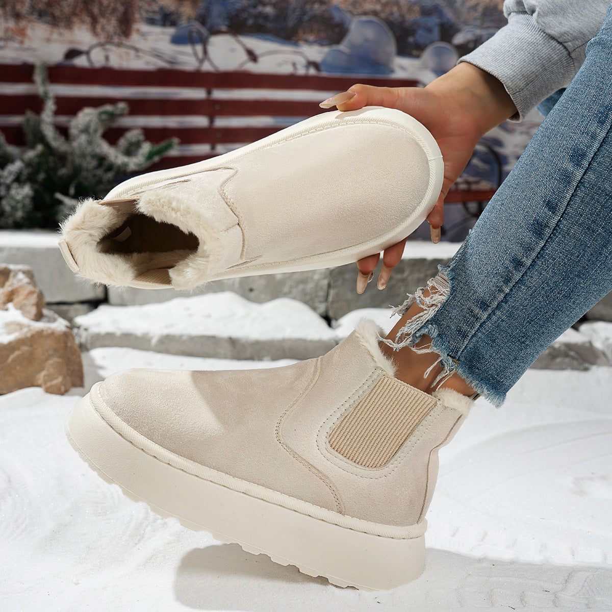 Plush-lined platform ankle boots – cream pair outdoors in snow