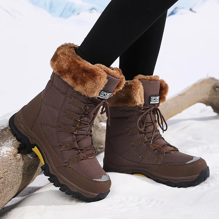 Side view of coffee-brown winter boots showing the heel and outsole