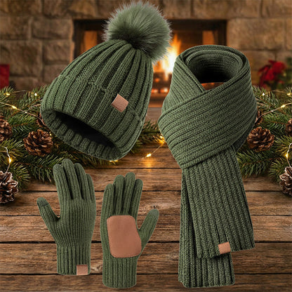 Winter hat scarf and glove set – olive set beside festive lights