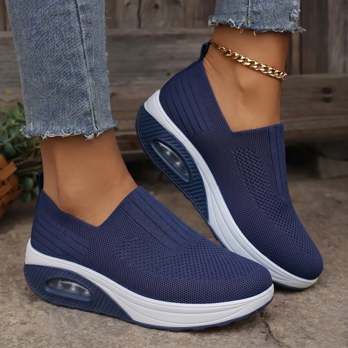 Women's walking trainers shown on foot