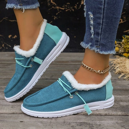 Auldweave women's lightweight fleece-lined winter shoes – teal pair worn from the side