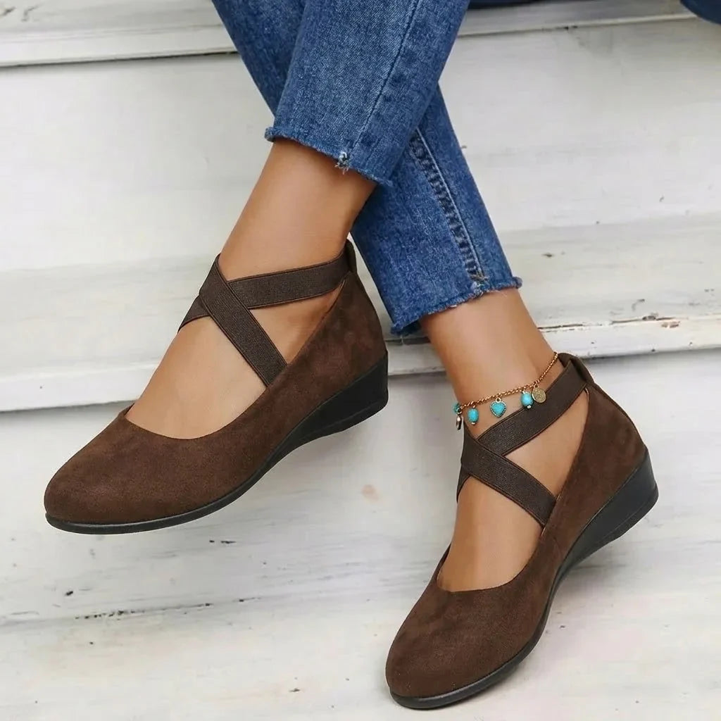 Brown Mary Jane flats for women, angled on-foot view