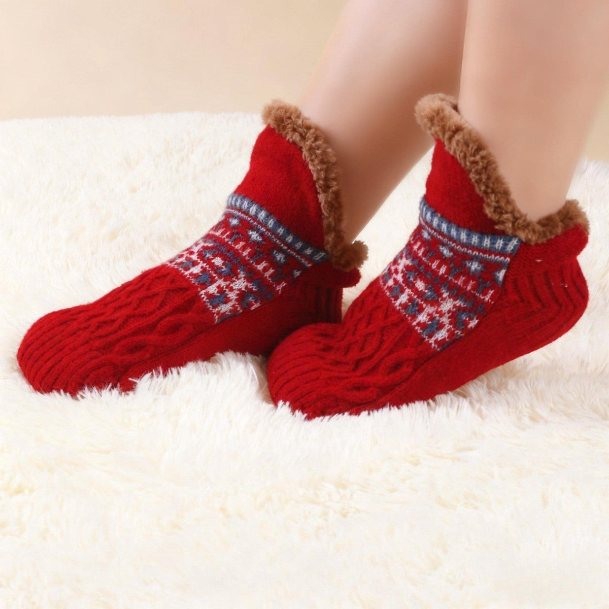 Auldweave warm fleece-lined slipper socks – burgundy pair worn on a soft rug