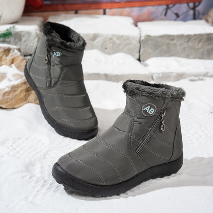 Side view of grey winter ankle boots with fleece collars