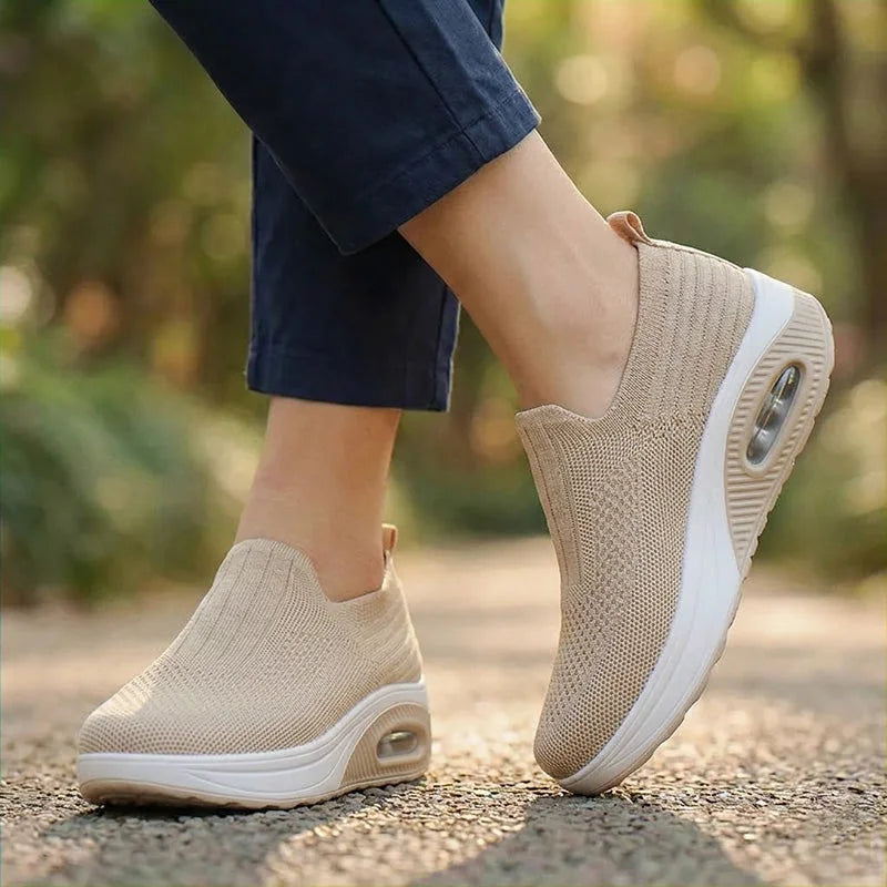 Women's walking trainers shown on foot