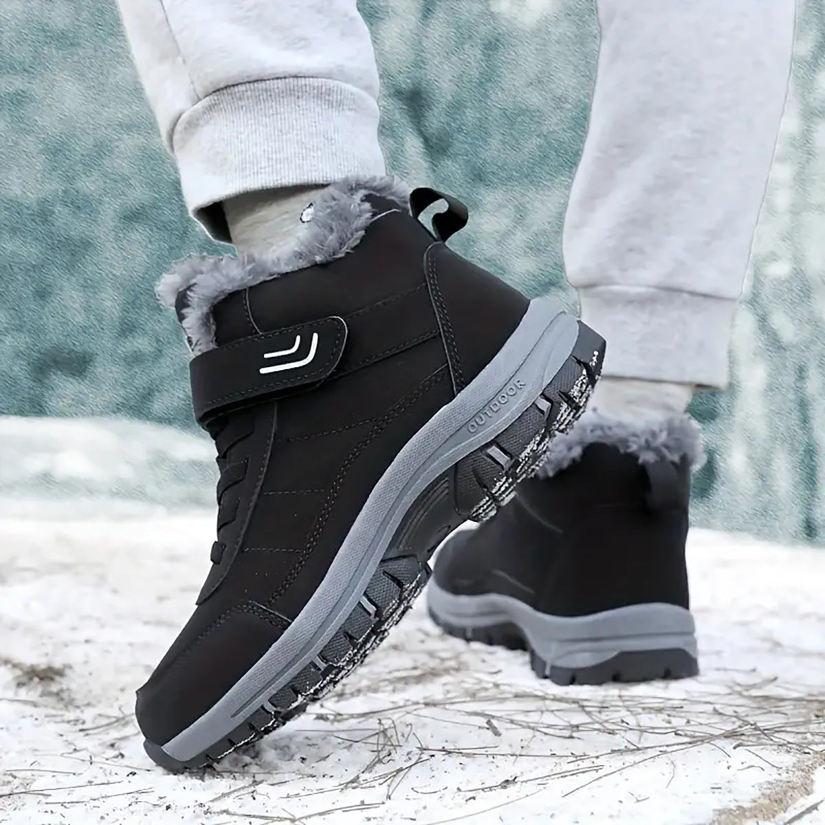 Side view of black winter boots showing the heel and sole