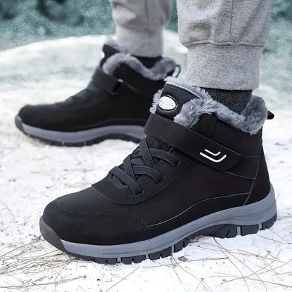 Close-up of black winter boots showing the ankle straps and laces
