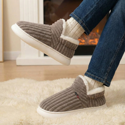 Auldweave unisex corduroy slipper boots – brown slipper boots worn by a fireplace