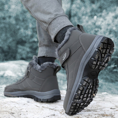 Grey winter boots showing the textured outsole