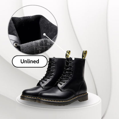 Black leather boots with laces on a white background, featuring an inset showing the insole.