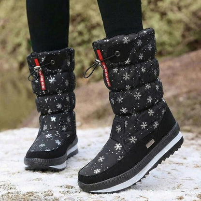 Auldweave women's waterproof mid-calf snow boots – black snowflake boots worn in snow