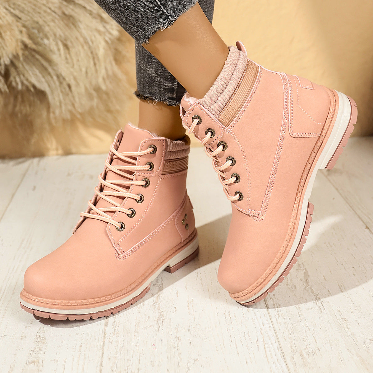 Faux-fur-lined winter ankle boots – pink pair side view on feet