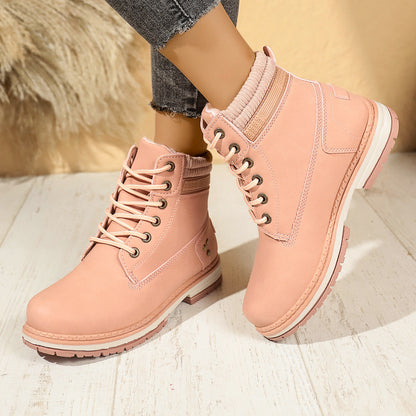 Faux-fur-lined winter ankle boots – pink pair side view on feet