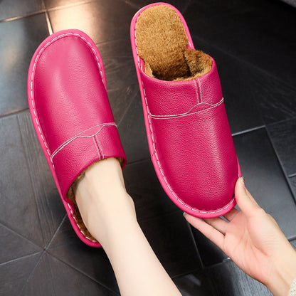 Auldweave warm wide fit leather slippers – pink slipper worn with matching pair held