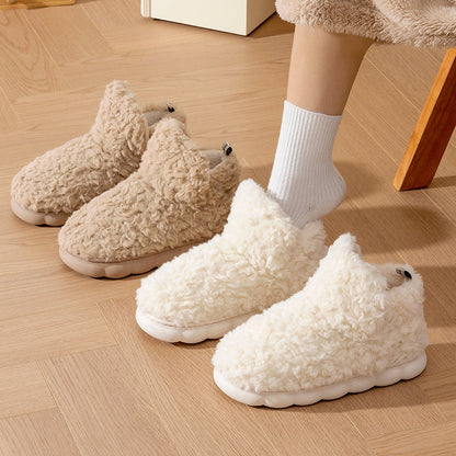 Plush fleece ankle slippers – cream and brown pairs worn indoors