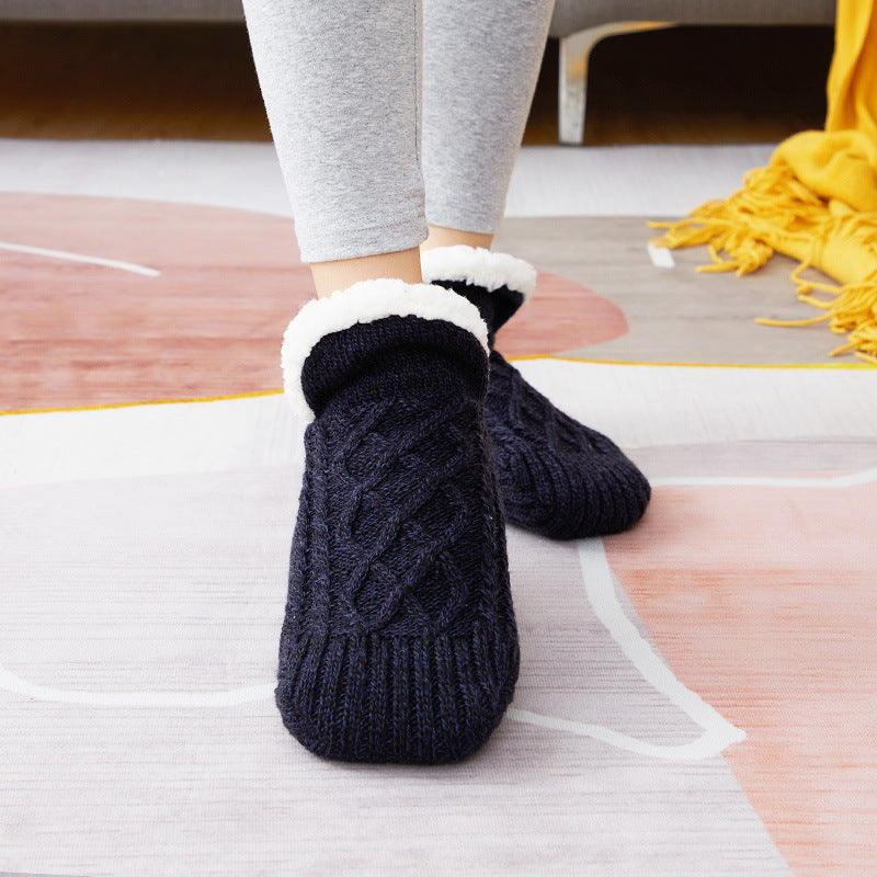 Auldweave unisex soft fleece-lined slipper socks – black pair worn indoors