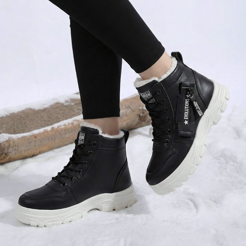 Auldweave women's fleece-lined winter ankle boots – black boots worn from the side in snow