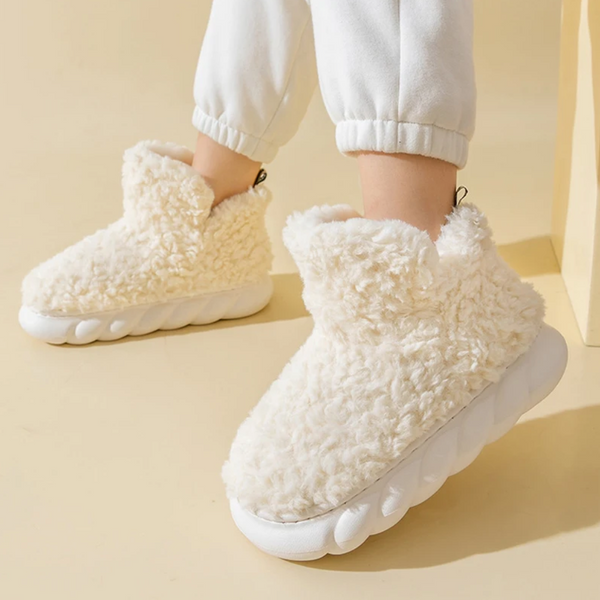 Plush fleece ankle slippers – cream pair worn indoors