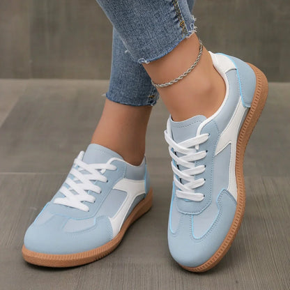 Women's walking trainers shown on foot