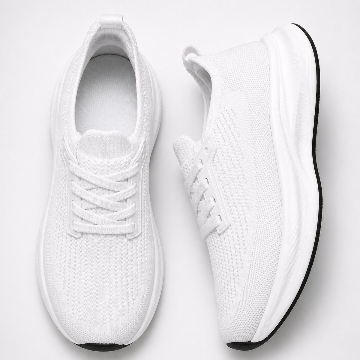 White wide toe breathable knit trainers in top and side studio views