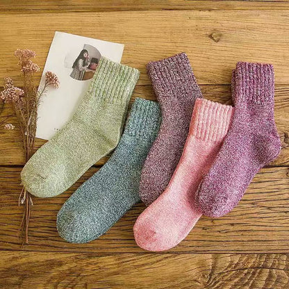 Five-pair thermal wool-blend socks – five pairs arranged on wood