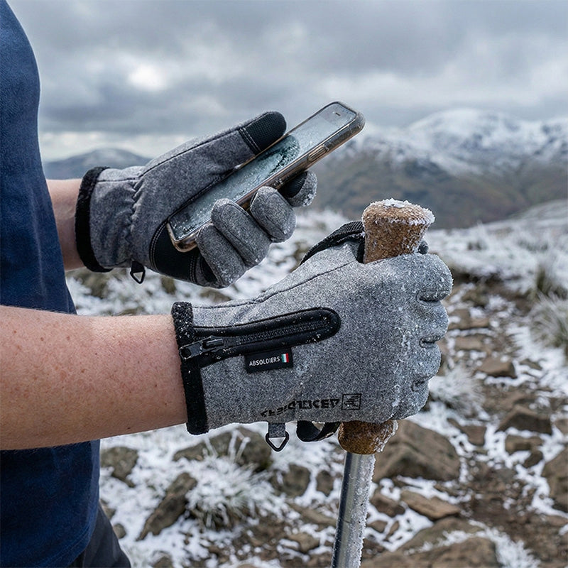 Winter touchscreen gloves – grey gloves used with a phone outdoors