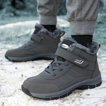 Grey fleece-lined winter boots worn outdoors