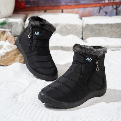 Black winter ankle boots showing the side zippers