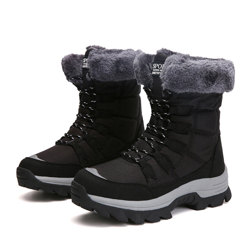 Black lace-up winter boots with grey faux-fur cuffs on a white background
