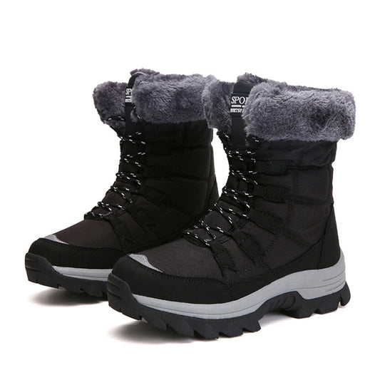 Black lace-up winter boots with grey faux-fur cuffs on a white background