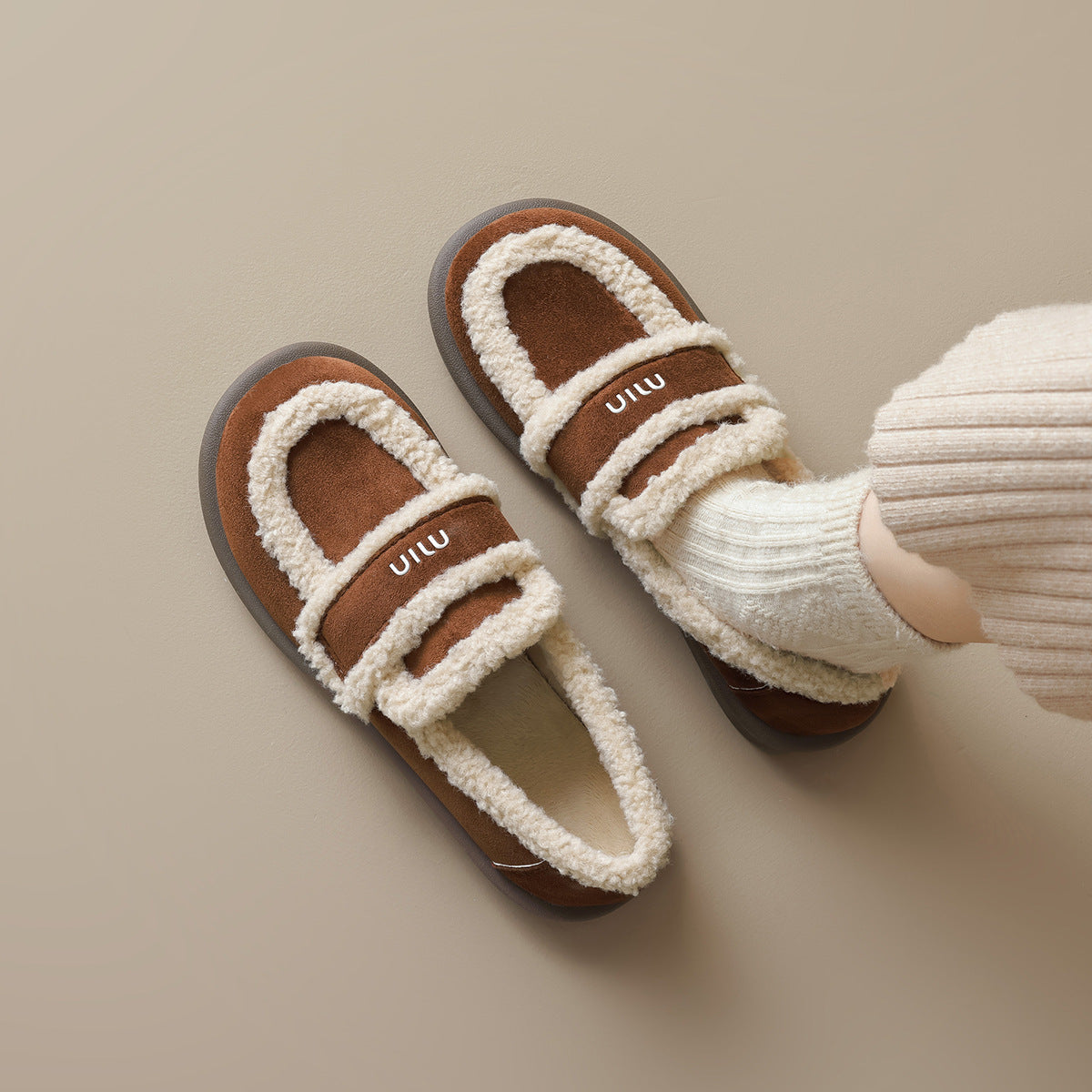 Auldweave women's fleece-lined slip-on loafers – brown pair worn in a seated view