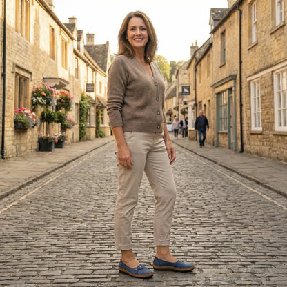 Women's navy loafers in a lifestyle setting