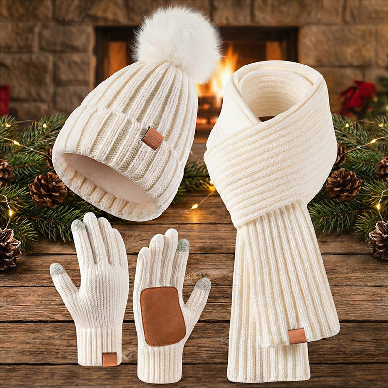 Winter hat scarf and glove set – cream set beside festive lights